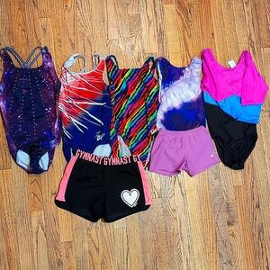 Bundle of gymnastics (5) leos & (2) shorts, sz child large, GK /Justice/Destira